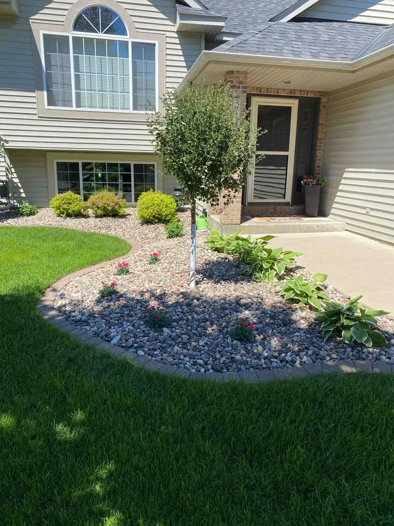 Residential landscaping project completed by Minnlawn